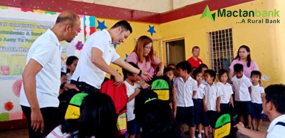 Mactanbank - Cebu City Branch together with their very own Branch Manager Ruel Evalaroza at Basak Community Elementary School.